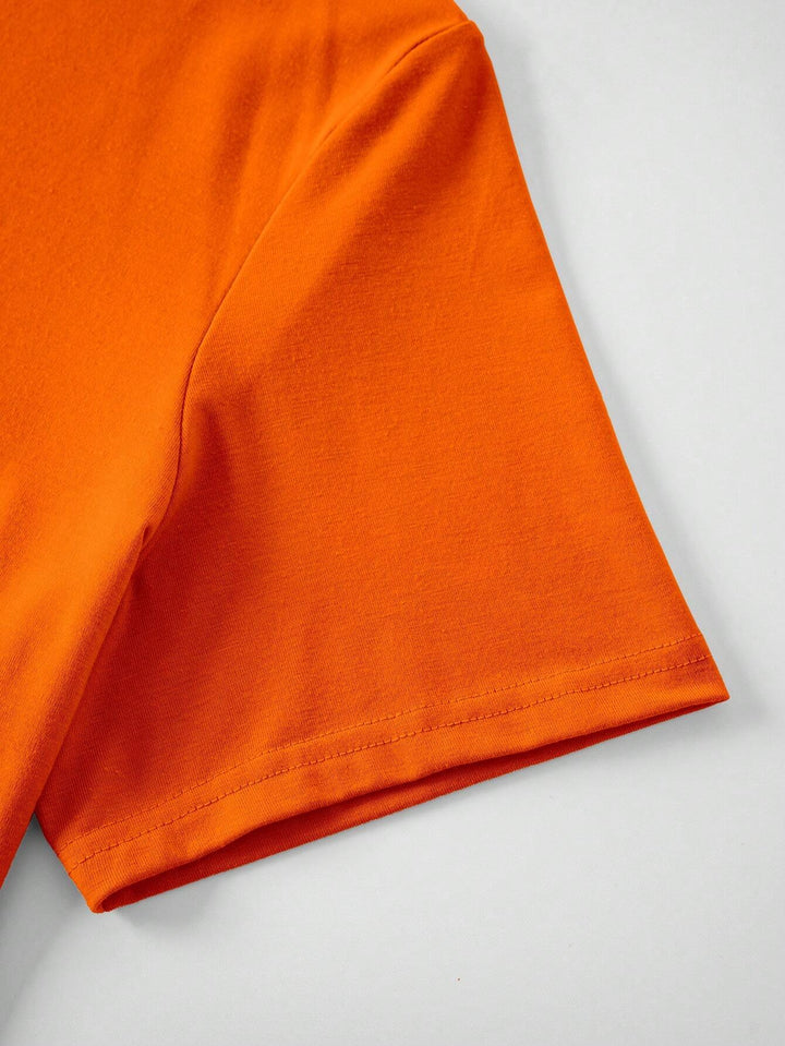 Maglietta slim fit arancione con stampa da uomo