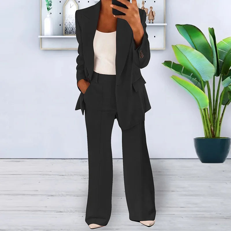 Tailleur pantalone con pantaloni a gamba larga da donna