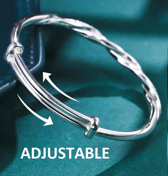 Bracciale rigido intrecciato color argento