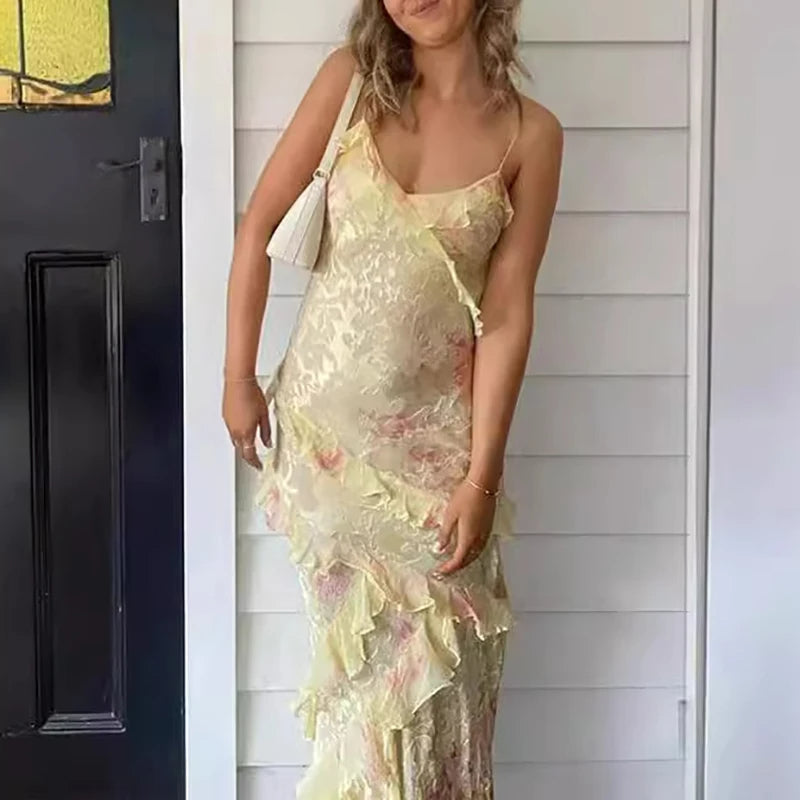 Abito lungo boho colorato con volant e scollo a V