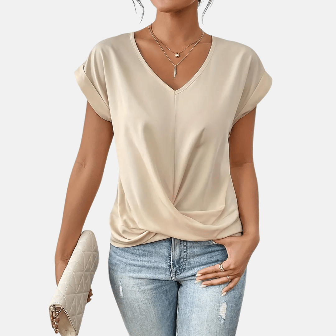 Blusa con scollo a V e orlo drappeggiato da donna