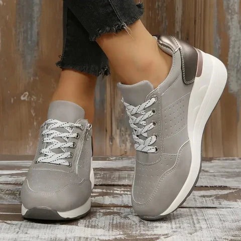 Sneakers ergonomiche con zip laterale da donna