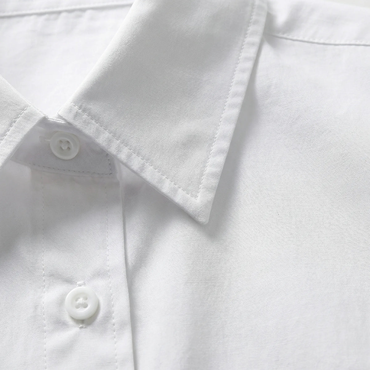 Blusa Strutturata con Bottone Anteriore e Scollo Relaxed