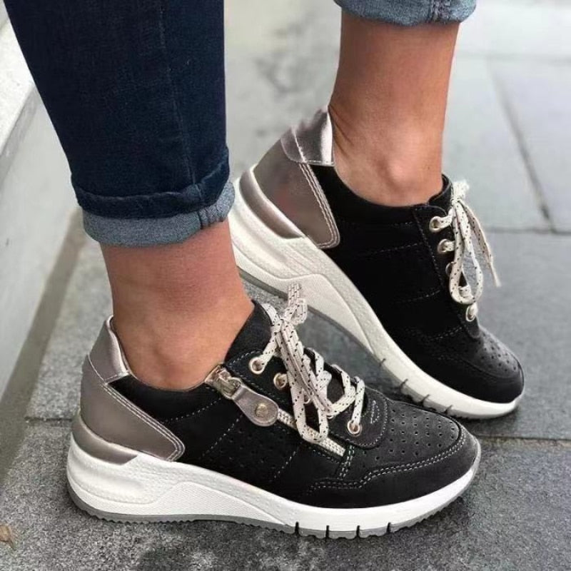 Sneakers ergonomiche con zip laterale da donna