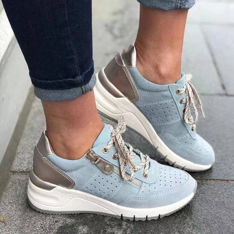 Sneakers ergonomiche con zip laterale da donna