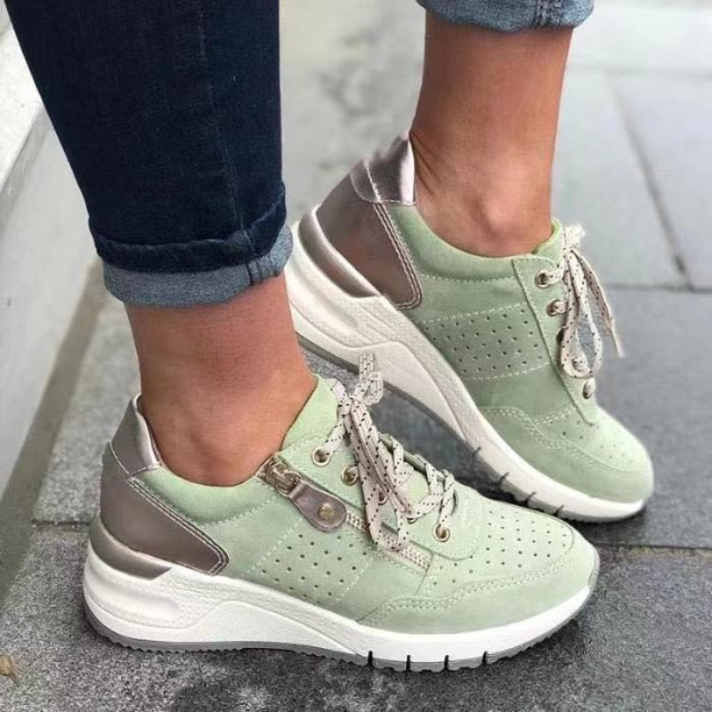 Sneakers ergonomiche con zip laterale da donna