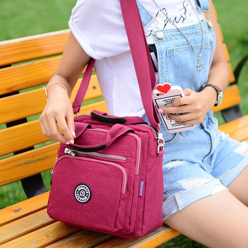 Borsa a tracolla multifunzione idrorepellente