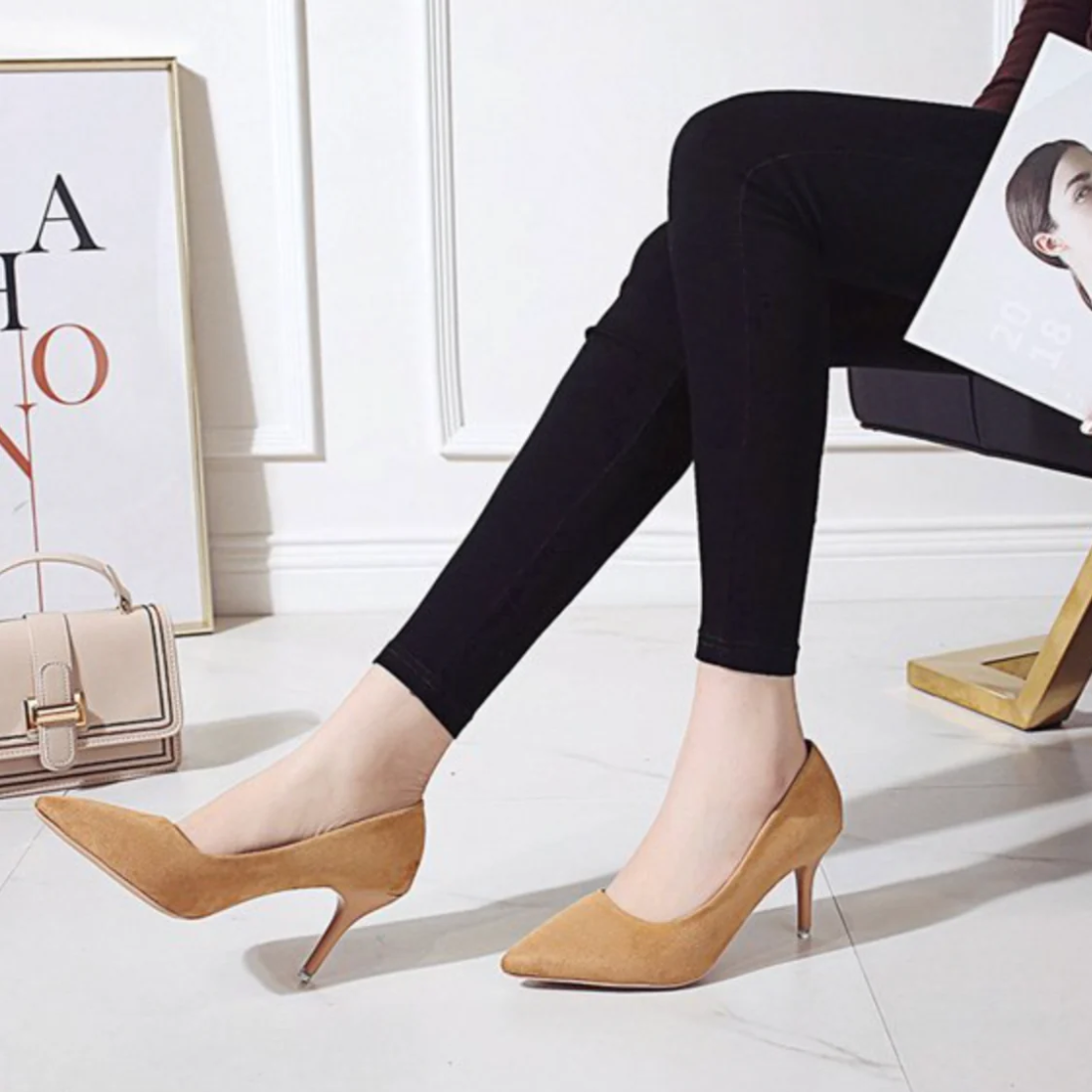 Eleganti décolleté con tacco alto e stampa leopardata