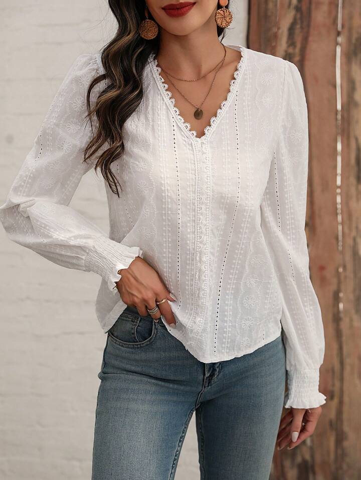Blusa con scollo a V e bordi in pizzo a maniche lunghe da donna