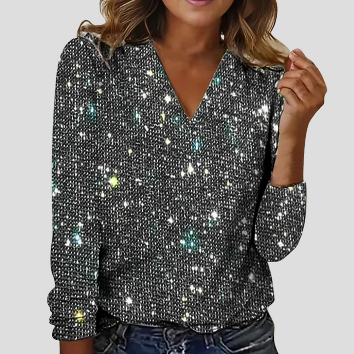 Elegante camicetta con scollo a V e maniche lunghe, decorata con paillettes