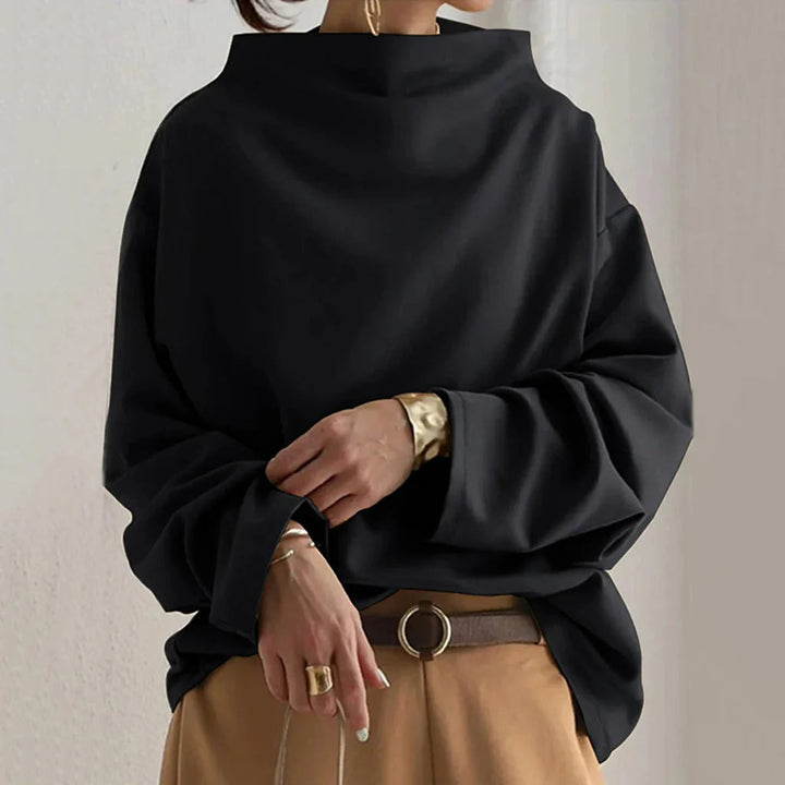 Top minimalista dalla vestibilità ampia: semplicità senza tempo e comfort quotidiano