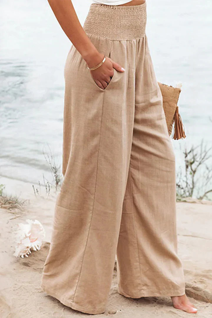 Eleganti pantaloni palazzo elasticizzati da donna