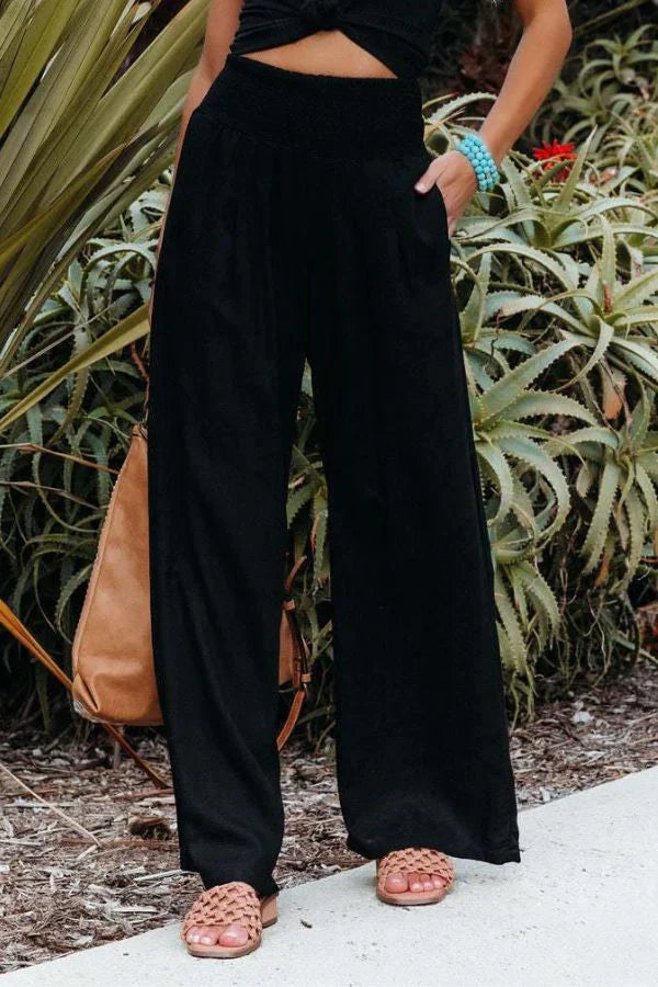 Eleganti pantaloni palazzo elasticizzati da donna