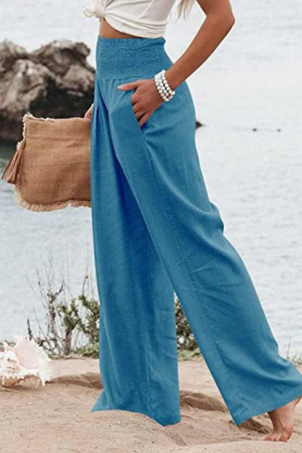 Eleganti pantaloni palazzo elasticizzati da donna