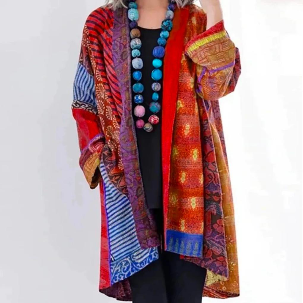 Cardigan aperto in maglia morbida da donna