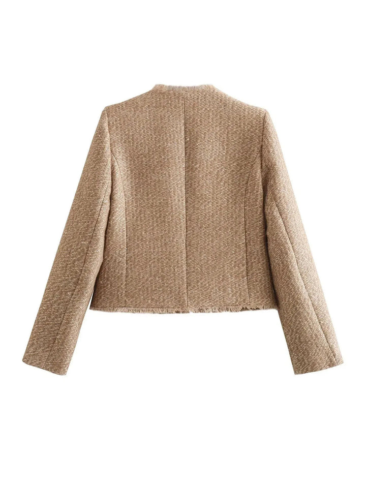 Elegante giacca corta in tweed da donna: raffinatezza senza tempo con un tocco moderno