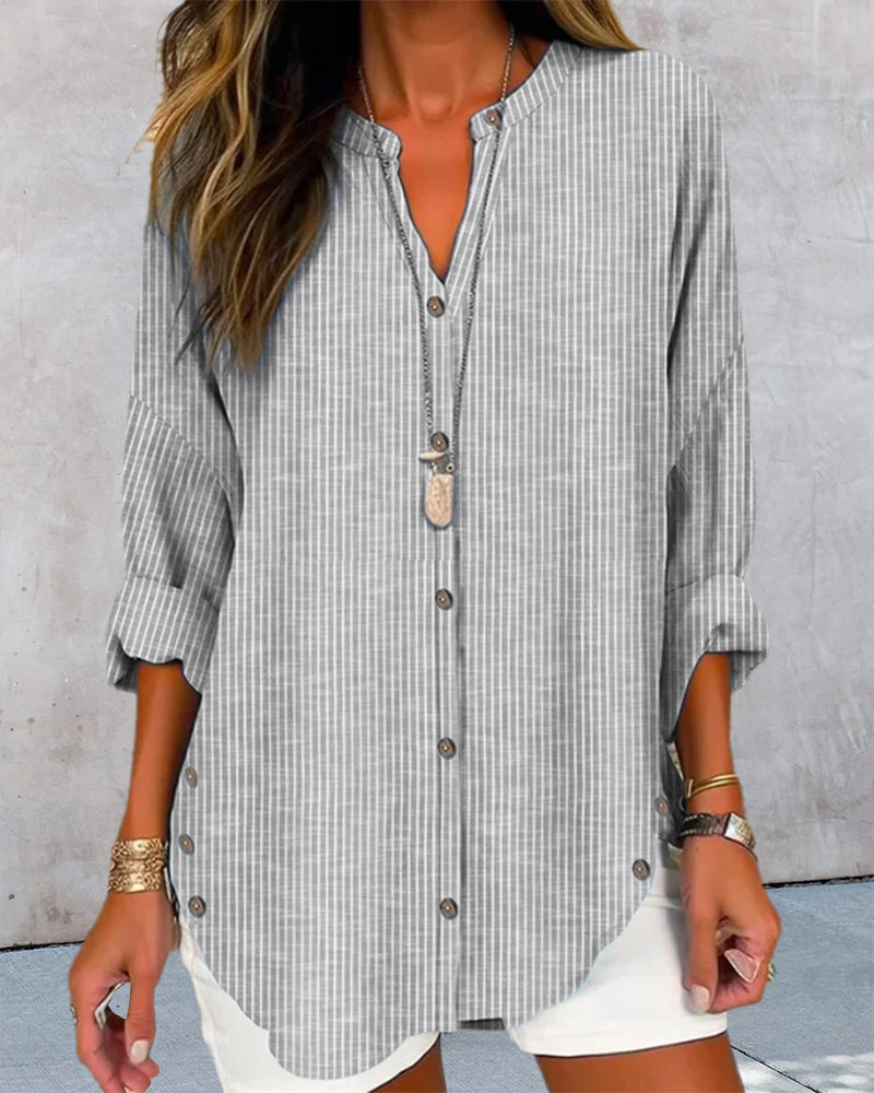 Top alla moda con stampa a righe e vestibilità elegante