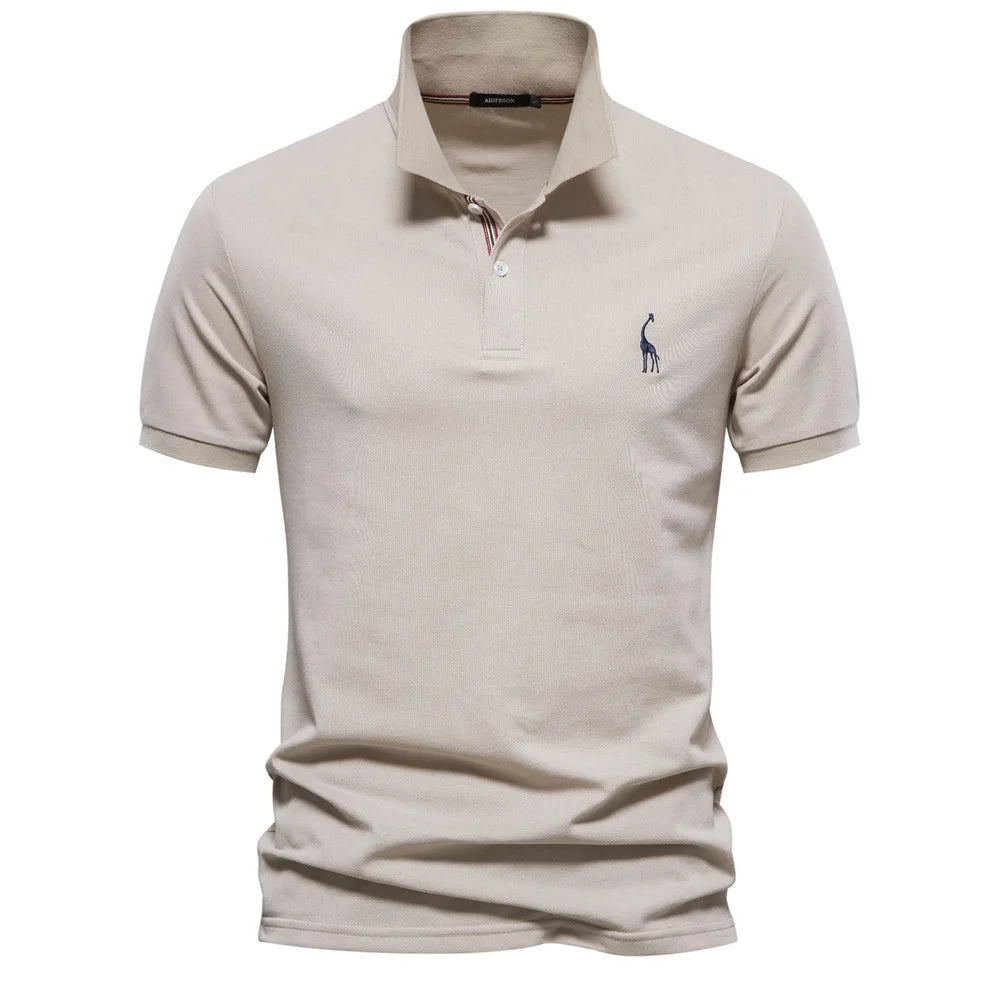 Polo in cotone di lusso con ricamo a forma di cervo