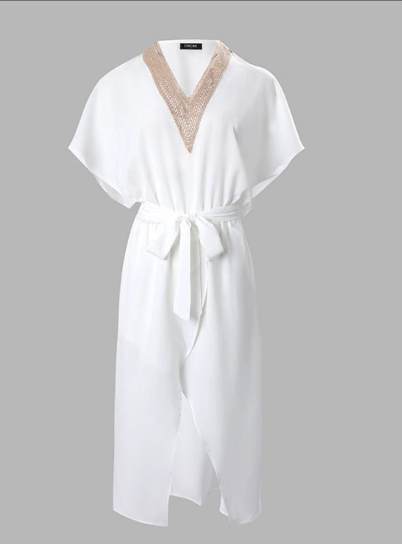 Abito midi bianco con scollo a V