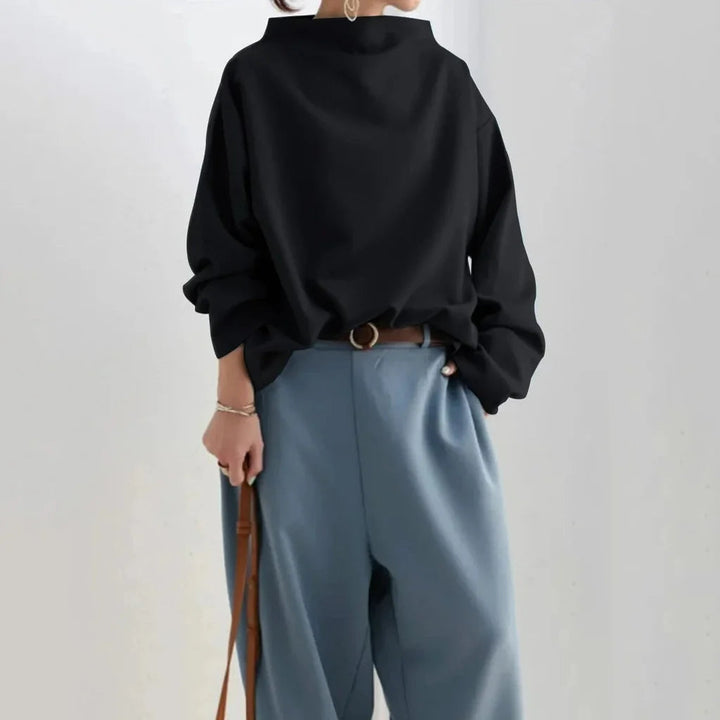 Top minimalista dalla vestibilità ampia: semplicità senza tempo e comfort quotidiano