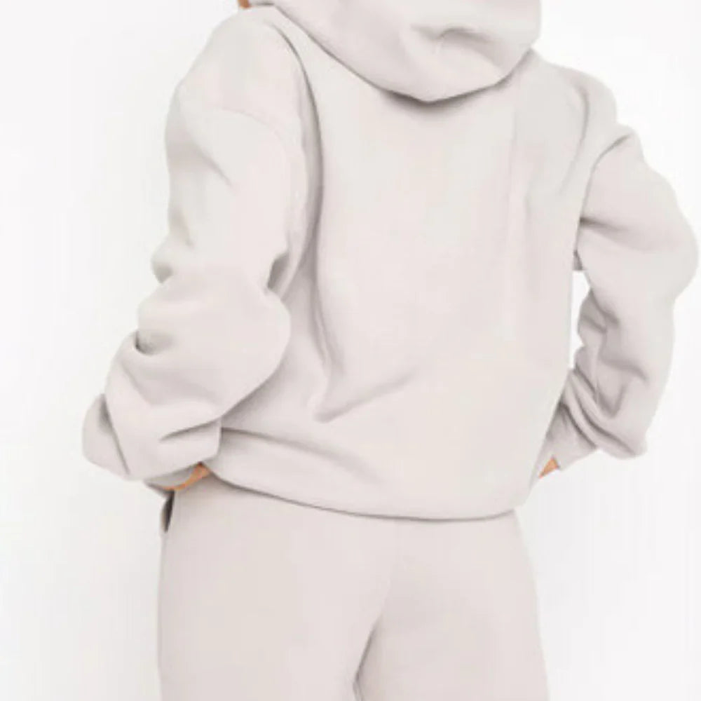 Tuta con felpa con cappuccio e pantaloni jogger