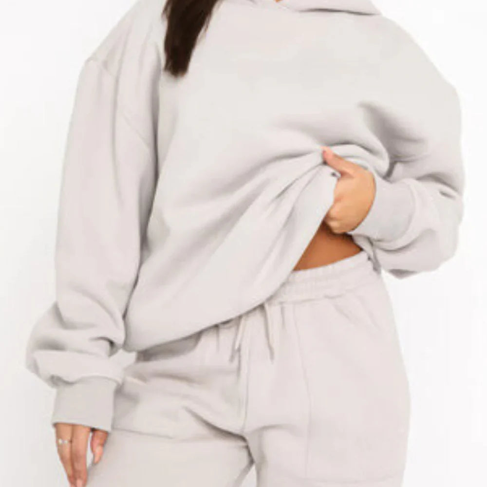 Tuta con felpa con cappuccio e pantaloni jogger