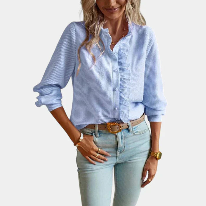 Camicetta da donna a righe con volant ed elegante chiusura a bottoni
