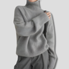 Maglione invernale da donna in maglia fitta simile alla lana con collo alto