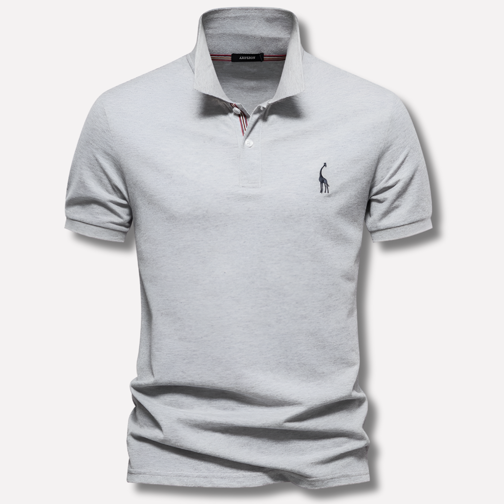 Polo in cotone di lusso con ricamo a forma di cervo