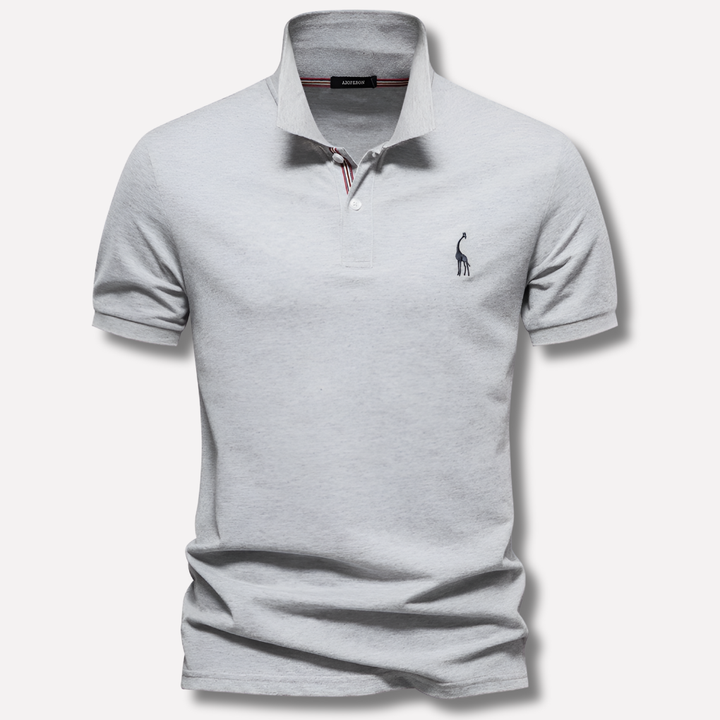 Polo in cotone di lusso con ricamo a forma di cervo