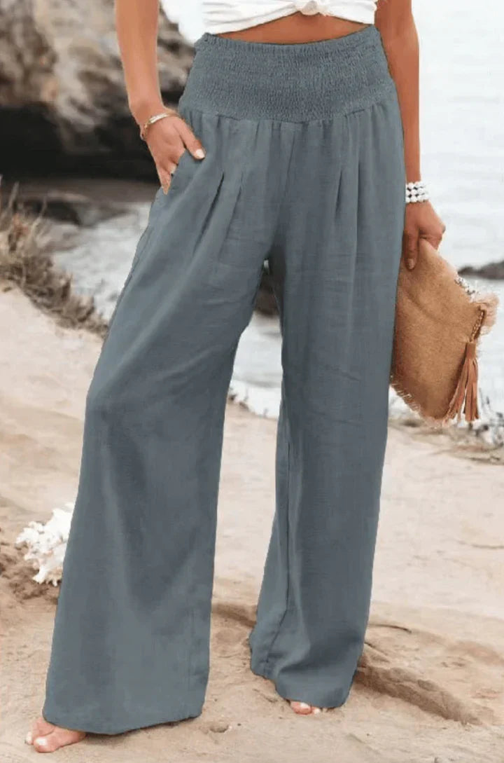 Eleganti pantaloni palazzo elasticizzati da donna
