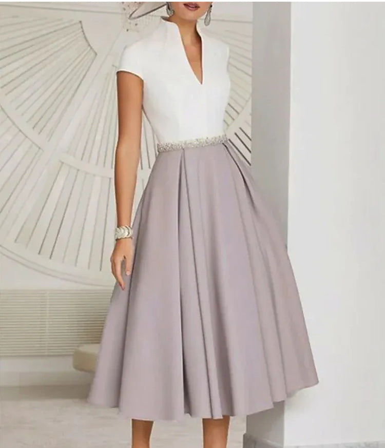 Abito estivo svasato color block con scollo a V da donna