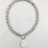 Collana con perla d’acqua dolce barocca e catena in oro e argento