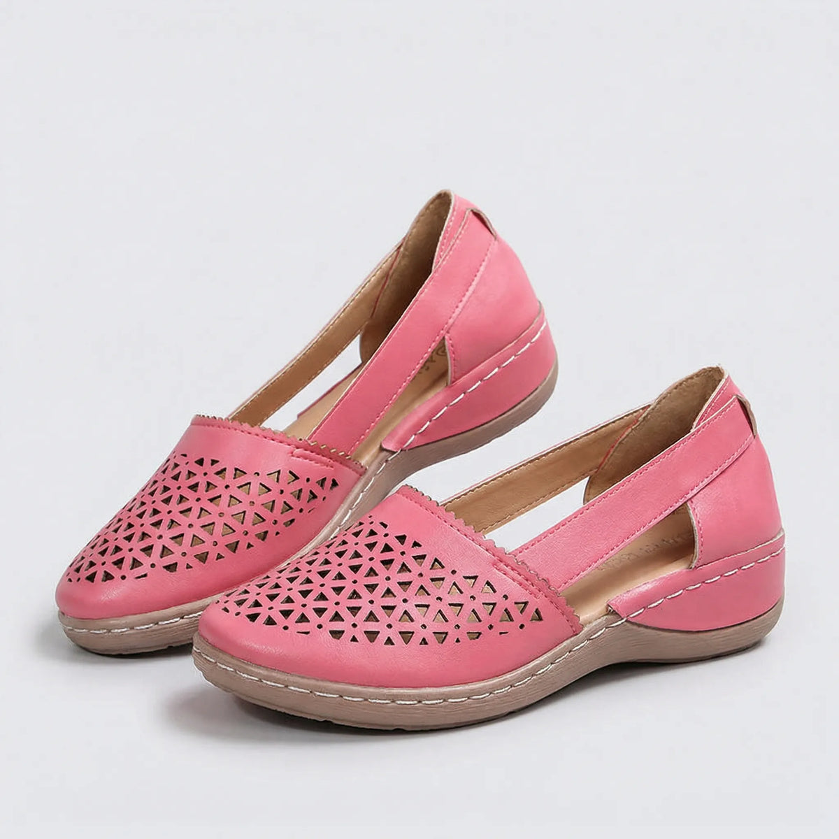 Scarpe slip-on con tomaia perforata e zeppa bassa