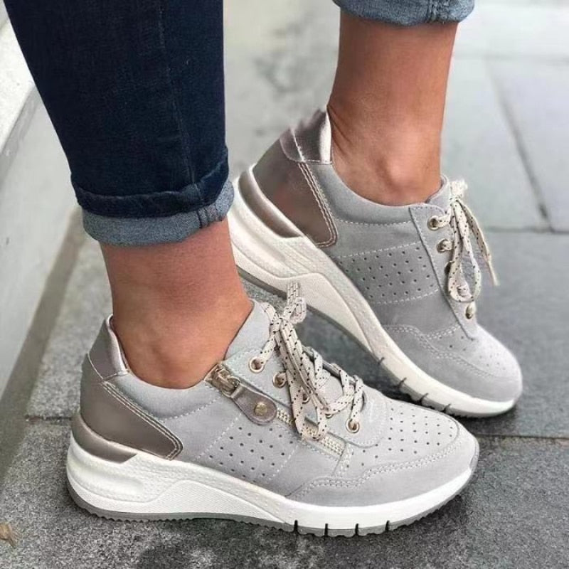 Sneakers ergonomiche con zip laterale da donna