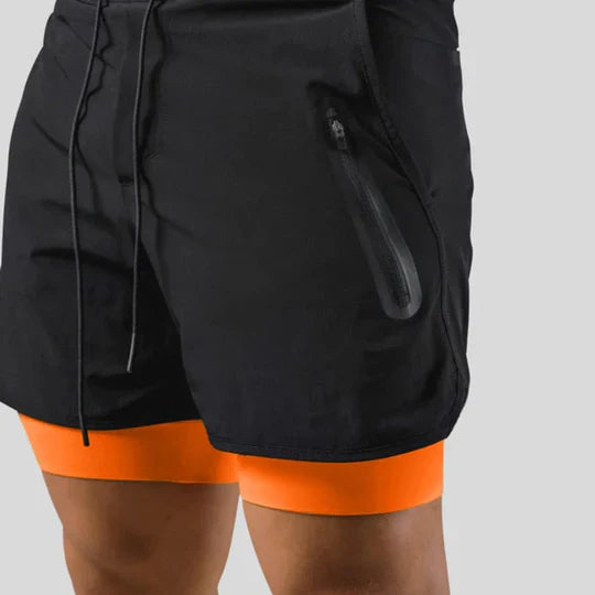 Pantaloni sportivi 2 in 1 con strato a compressione da uomo