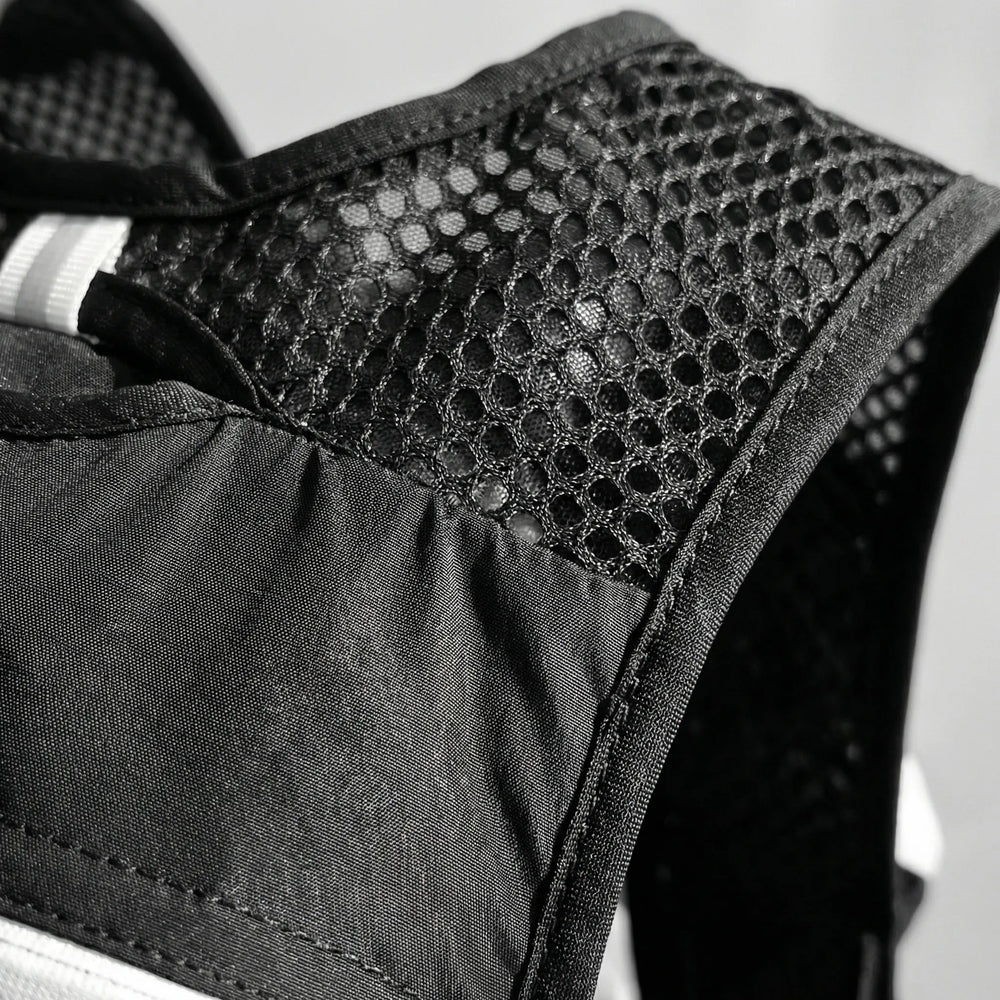 Stridepack - Gilet da corsa leggero con sistema di idratazione