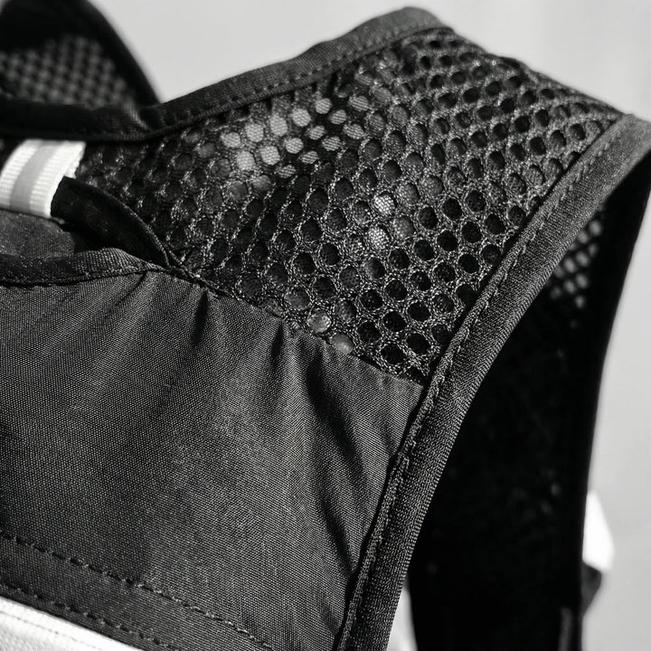Stridepack - Gilet da corsa leggero con sistema di idratazione