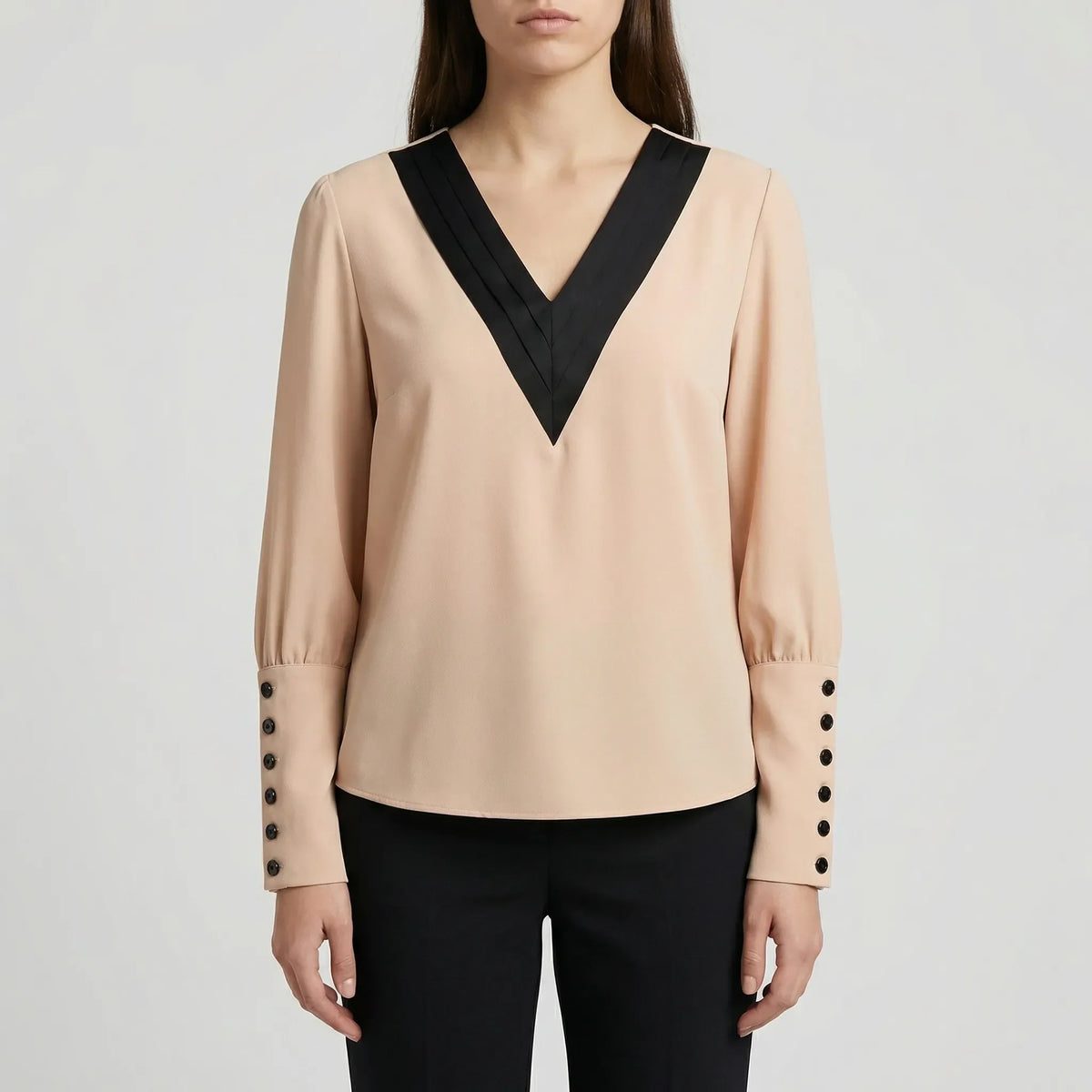 Blusa da donna con scollo a V e maniche a sbuffo