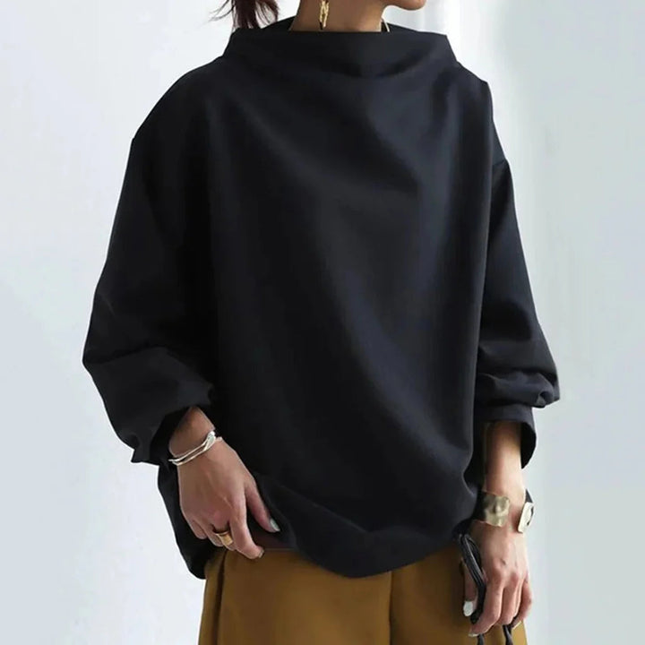 Top minimalista dalla vestibilità ampia: semplicità senza tempo e comfort quotidiano