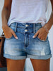Shorts di jeans strappati da donna