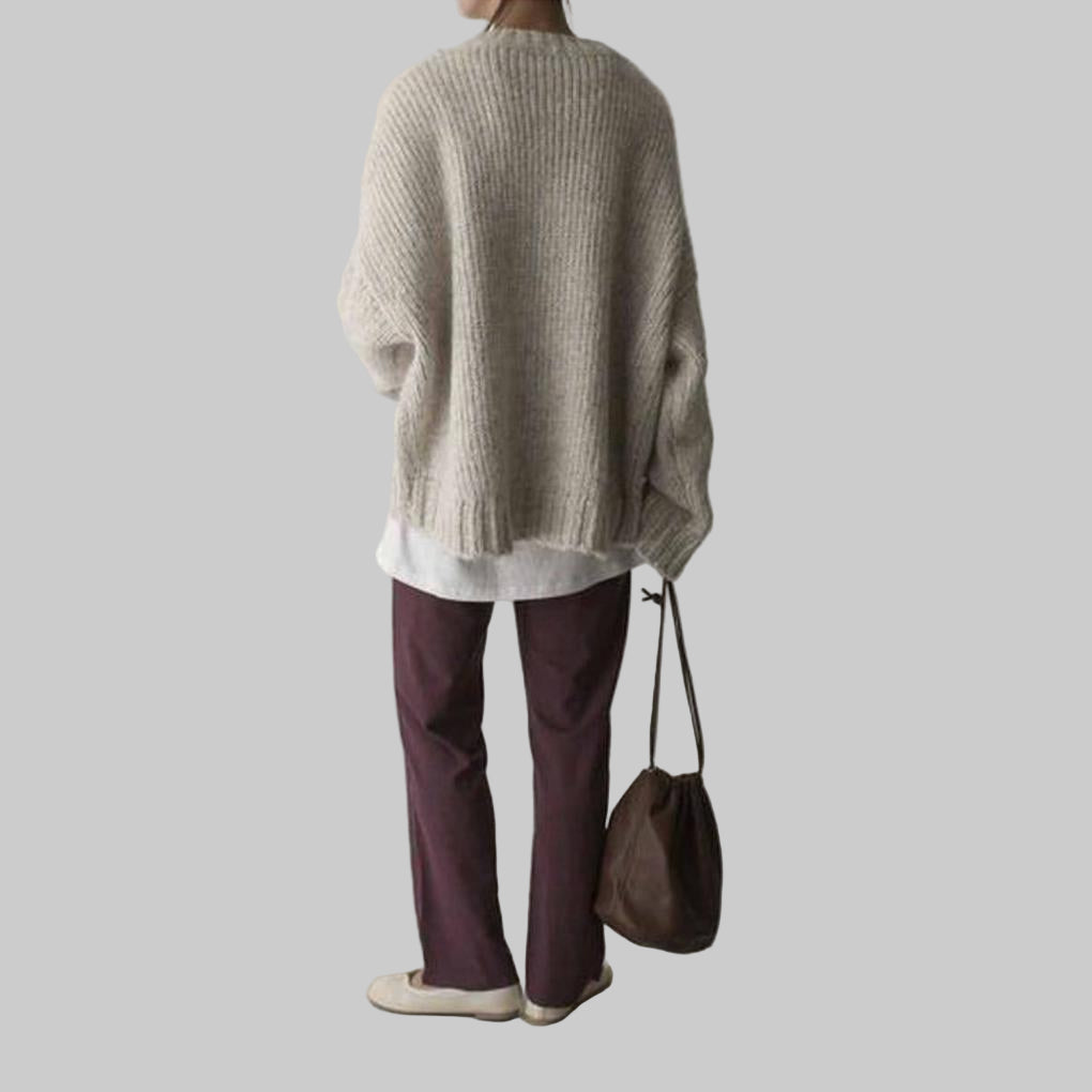 Maglione Oversize Avorio con Tasca Frontale – Strato Quotidiano Rilassato