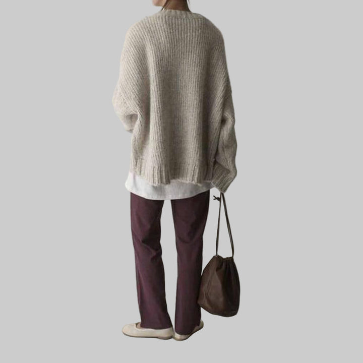 Maglione Oversize Avorio con Tasca Frontale – Strato Quotidiano Rilassato