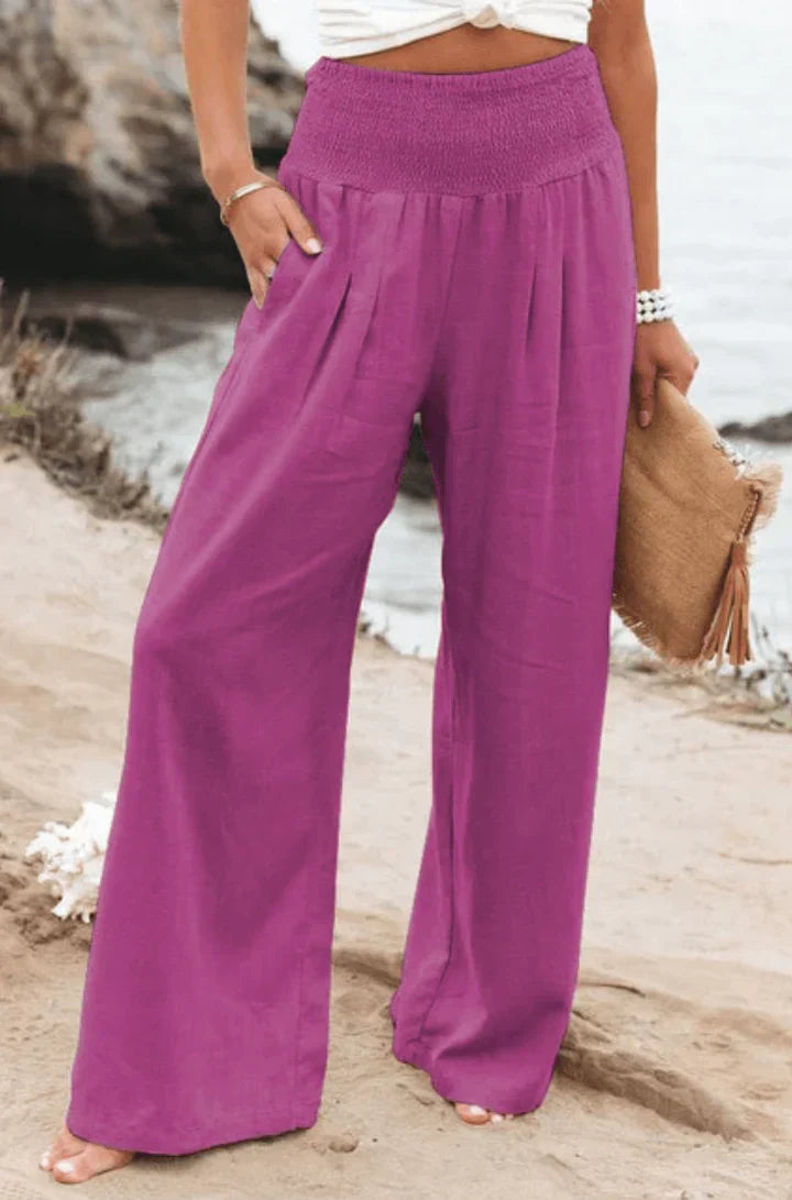 Eleganti pantaloni palazzo elasticizzati da donna