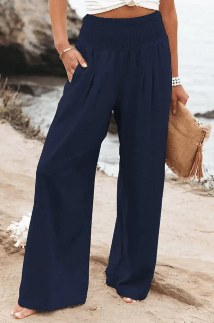 Eleganti pantaloni palazzo elasticizzati da donna