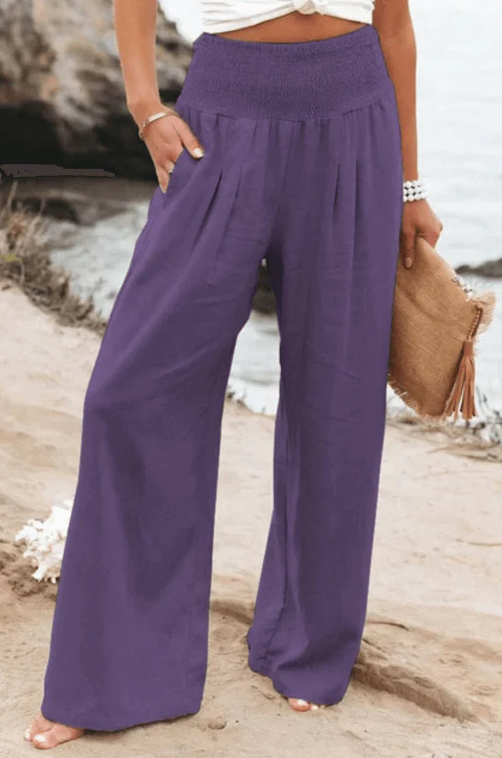 Eleganti pantaloni palazzo elasticizzati da donna